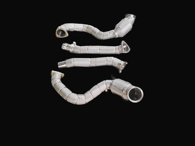 Aston Martin DB12 M177 stainless steel downpipes with heat shield wrap — flat layout view