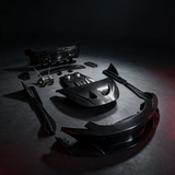 YPG Longtail Aero Kit carbon fiber body conversion for McLaren 570S — dark studio with red ambient glow